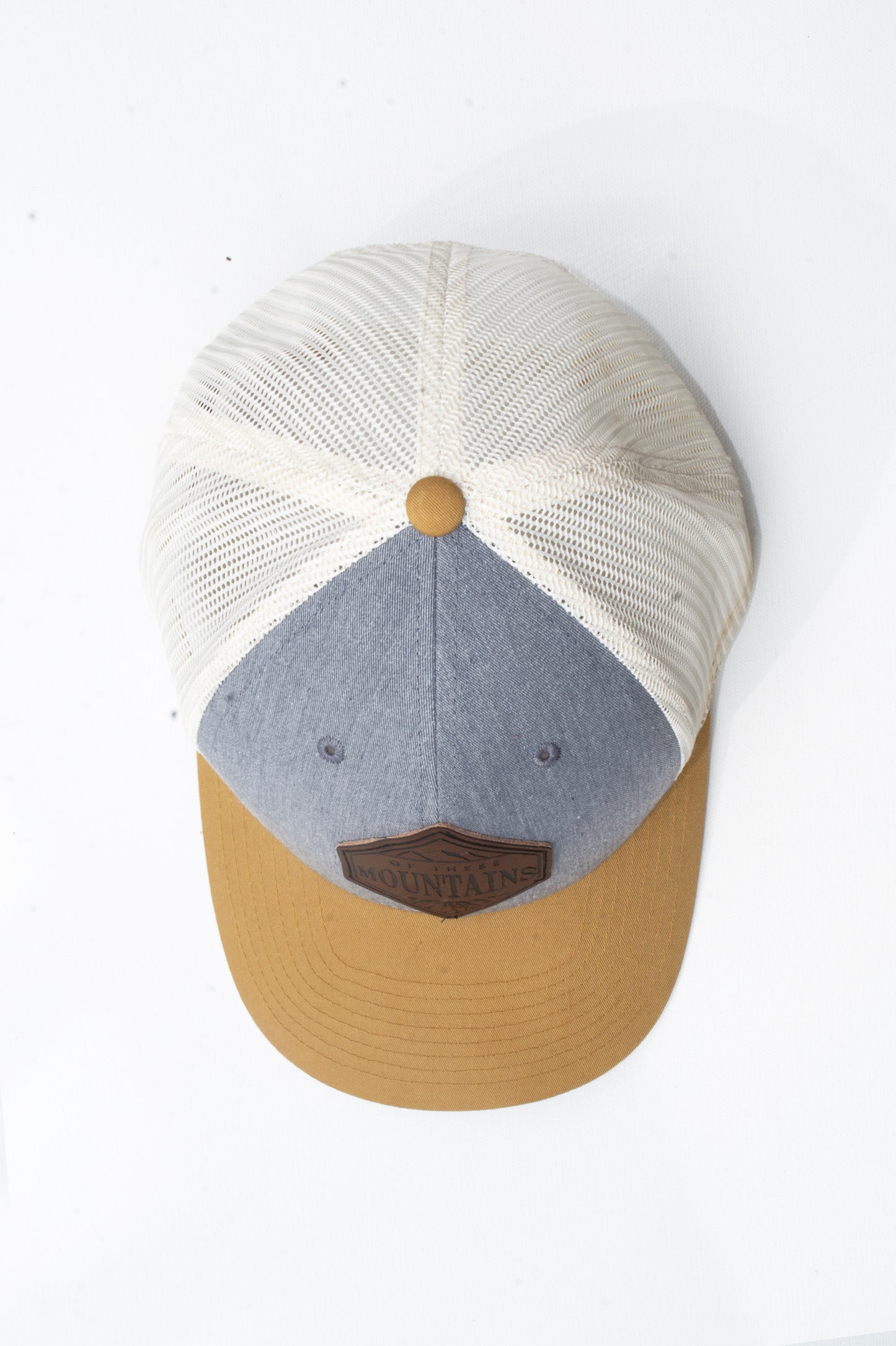Of These Mountains Loving Leather Patch Trucker Hat