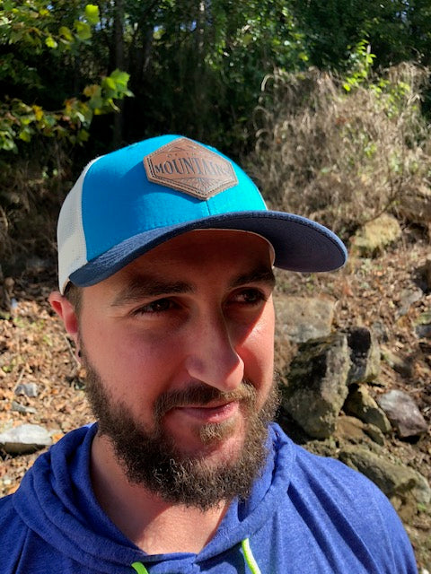 Of These Mountains Bluebird Trucker Hat
